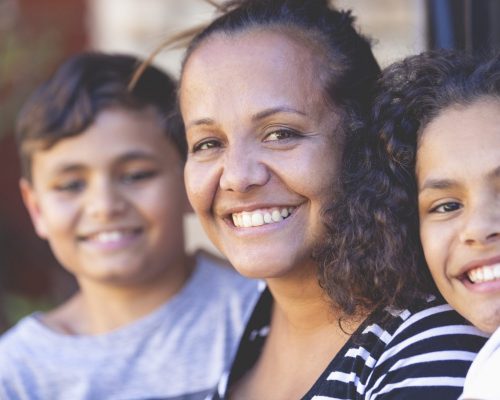 First Nations family smiling